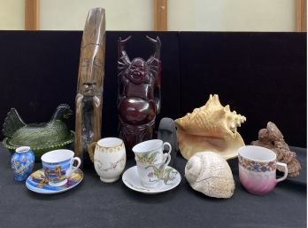 An Assortment Of Curio Cabinet Items