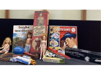 An Assortment Of Vintage Toys And Childrens  Records