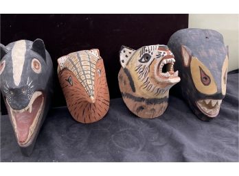 4 Hand Carved Wood Masks