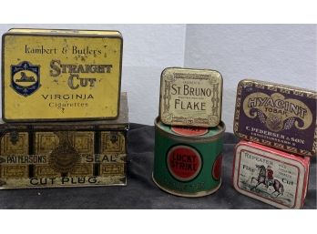An Assortment Of Vintage Tobacco Tins