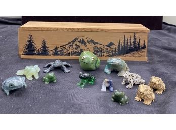 A Collection Of Miniature Frog Figurines