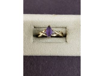 10 Karat Gold Ring With Purple Stone