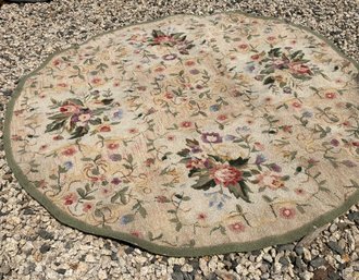 Round Hooked Rug With Green Border And Floral Decoration