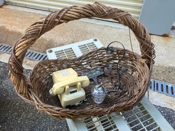 Handled Basket With Yellow Vintage Phone, Crystal/chrome Lighter, Bird Bathing Sign, And Iron Pot Holder