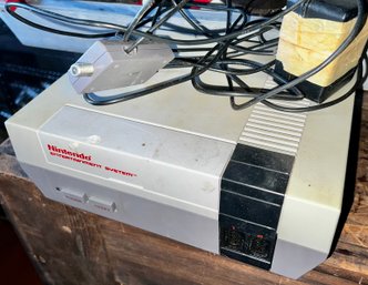 1985 Nintendo Game Console With Controls And Gun