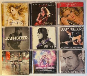 Lot Of 9 CDs: Taylor Swift, Justin Bieber, & The Jonas Brothers