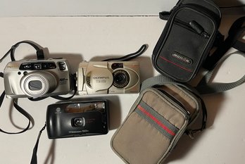 Lot 0f 3 Cameras And 2 Carrying Cases - Pentax, Olympus, Minolta