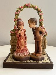 ANRI Wooden Carved Sarah Kay Club Figurines 'Youngman's Fancy' & 'Romantic Notions' With Rose Briar Backdrop