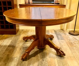 Solid Oak Claw Foot Pedestal Table With 2 Leaves