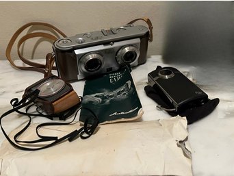 Flip Camera, Stereo Realist 45 White & Sekonic L86 Exposure Meter