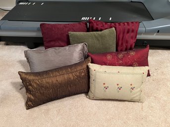 7 Pillows: Maroons, Browns, Grays