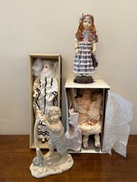 2- Resin Statues And 2 Porcelain Dolls