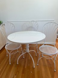 Wrought Iron Table With Glass Top And 3 Wrought Iron Chairs
