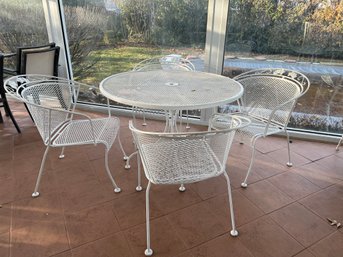 5- Piece Wrought Iron Table And Chairs