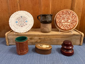 Alabaster Plate, Signed Pottery Pitcher, Pottery Sun Wall Hanging, Wood Trinket Box, Telephone Pole And Dice.