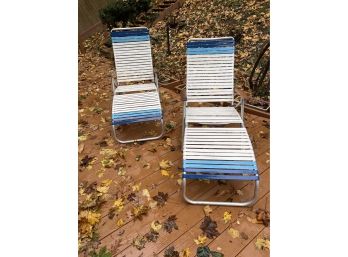 2 Wood, Aluminum, And Plastic Lounge Chairs
