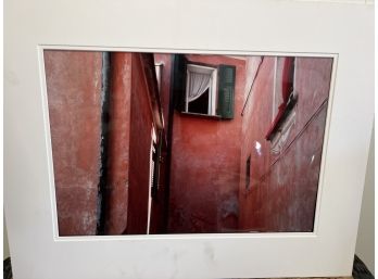 Photography Of A Red Building Window