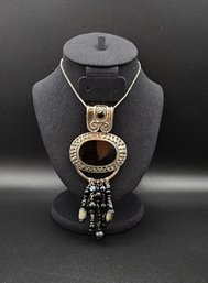 Large Black Onyx Pendant & Beads Set In A Hammered Art Deco Setting