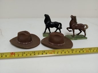 Two Stetson Hat Statues And Two Horse Statues
