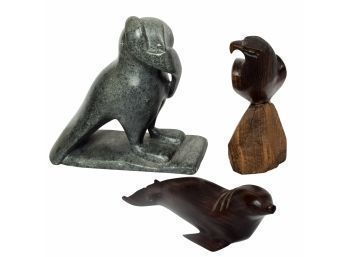 An Inuit Soapstone And 3 Ironwood Carvings