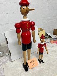 ORNAMENT/DECOR LOT 152-55: LOT OF 2 ARTICULATED PINOCCHIOS 1 LARGE 1 SMALL
