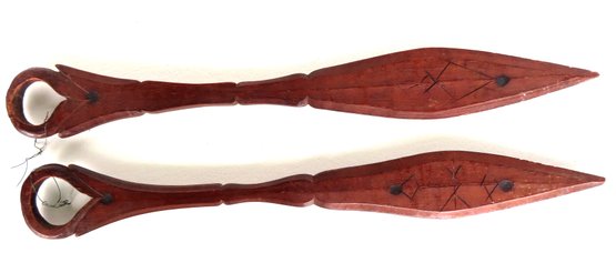 A Pair Of Indian Carved Wooden Dance Paddles With Primitive Incised Decorations, Chamfered Edge And Shaped Han