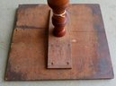 A Maple Candlestand With Rectangular Top, Turned Post Leading To Spider Scrolled Legs, Early 19th Century. The
