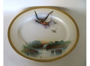 A Hand Painted Limoges Platter Hand Decorated With Mallard Ducks Flying Over Marshland