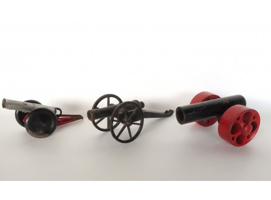 Grouping Of 3 Cannons. The First A Cork Shooting Toy - Works But Likely Had A Vehicle With It For Pulling - Ea