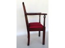 A Chippendale Mahogany Child's Chair Having A Pierced Carved Back, Scrolled Arms, And Chamfered Square Legs, 1