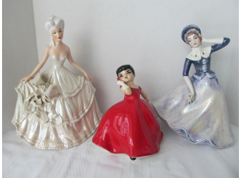 Three Ceramic Lady Figurines