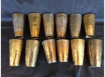 Twelve Ornate Brass Tumblers