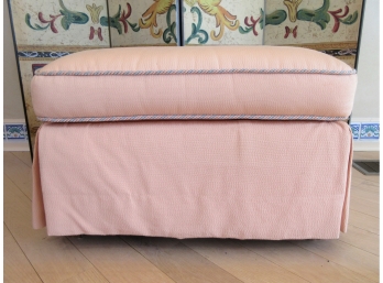 Ottoman With Pink Uhpolstery And Cording