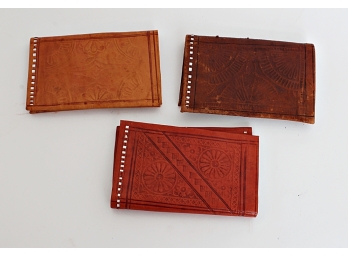 Three Tooled Leather Wallets