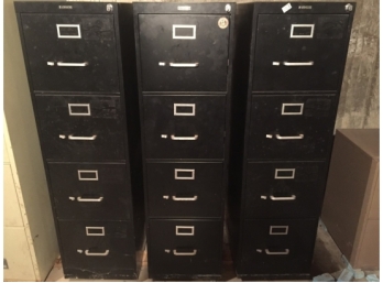 Set Of Three Metal Four Drawer Vertical File Cabinets.