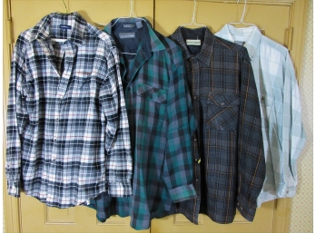 Group Of Four Flannel Shirts