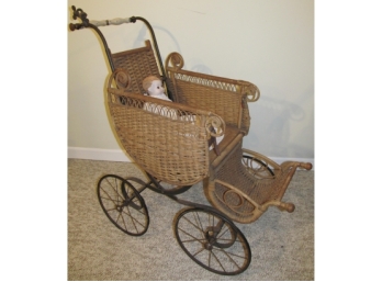 Antique Wicker And Cast Iron Baby Carriage With Doll