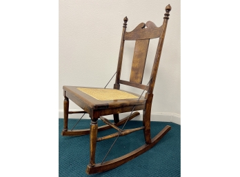 Antique Wood Rocker With Cane Woven Seat