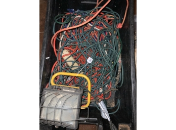 Black Plastic Bin With Extension Cords And Work Light
