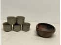 (5) STONEWARE LIBATION CUPS AND “M” SIGNED POTTERY POURING VESSEL