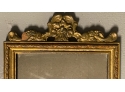 CARVED AND GILDED HALL MIRROR WITH CREST