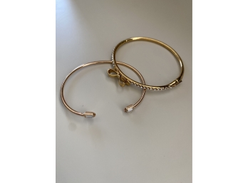 Two Gold Toned Bangles One Is Kate Spade