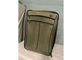 SWISS GREEN LUGGAGE SUIT CASE ON WHEELS