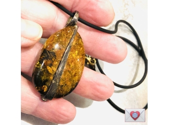 Large Natural Gem Amber Incarcerated In Handwrought Riveted Patinated Sterling On A Leather Cord 18'