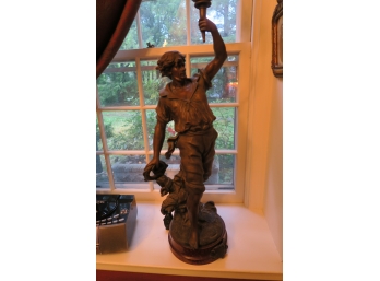 Figure Statue Holding Lamp