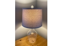 W - Clear Glass Bottle Shaped Lamp With White Linen Shade