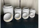 Four White Ceramic Lidded Counter Or Table Top Canisters By Arthur Wood