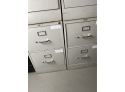 Four White Metal File Cabinets