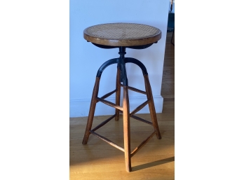 Antique Adjustable Height, Cast Iron And Wood And Caining, Swivel Bar Stool - One Cross Bar Is Damaged