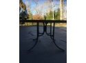 EQ U 54' Round Glass And Black Metal Outdoor Table